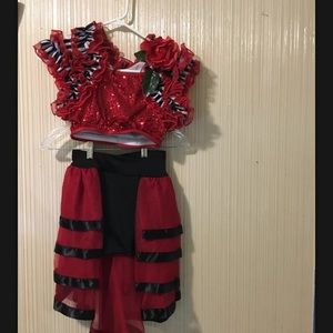 Red two piece costumes, and head piece included.